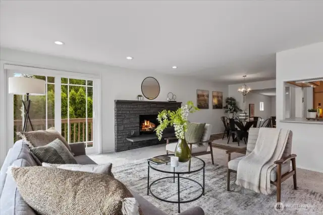Spacious living and dining room, along with kitchen have easy access to the large wrap around deck.