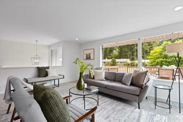 This classic split level entry with modern new chandelier contributes to the open feeling of this space.