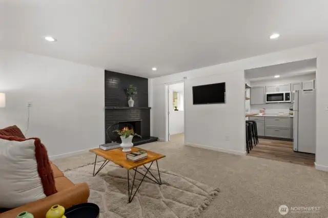 Additional living room on lower level complete with kitchenette and bedroom.