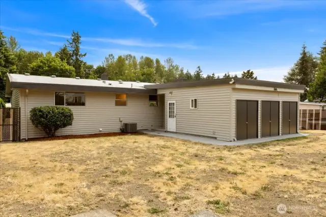 Beside the blank canvas this large lot offers, there is additional storage behind the bonus room.
