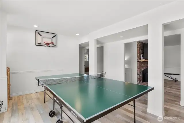 Lower level with access to newly poured patio. Ideal area to create kitchenette!