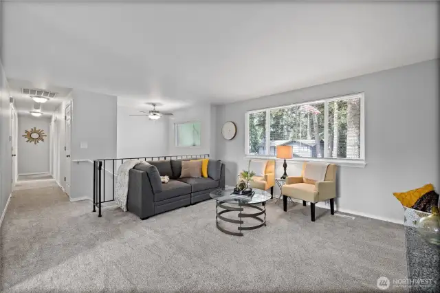 Looking down the hall, where you will find the 3 bedrooms and full bathroom.