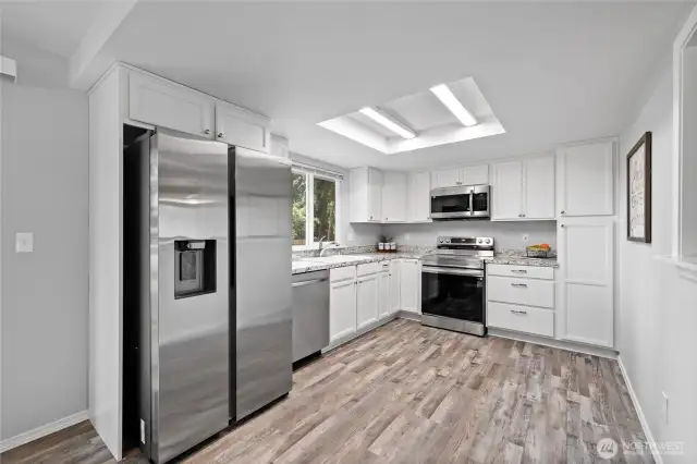 All new kitchen with stainless steel appliances, LVP flooring, soft close cabinets & Formica countertops.