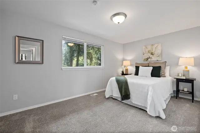 Primary bedroom looking to backyard.