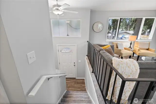 Now lets head down to the lower level where you will find the family room, 3/4 bath/utility room combo and access to the 2 car garage.