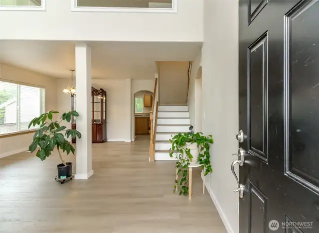 Upon entry your greeted by soaring ceilings and the formal living and dining room