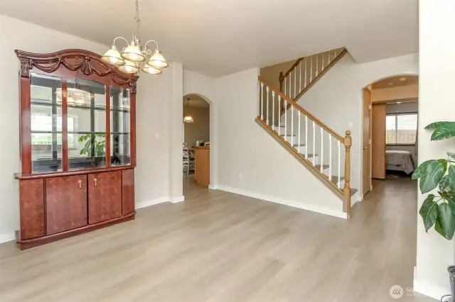 Upon entry your greeted by soaring ceilings and the formal living and dining room