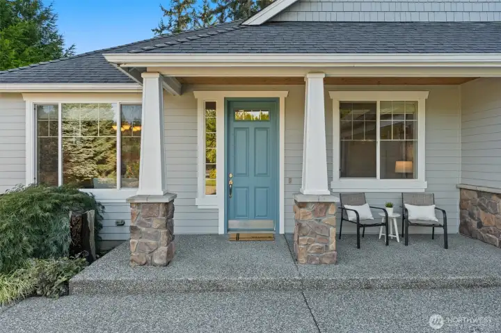 The inviting layout includes a living room with cozy fireplace, kitchen with granite counters, tile floors & backsplash, stainless appliances & pantry, dining room, and spacious primary suite with spa-like bath, skylight and walk-in closet.