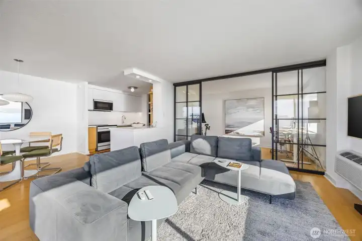 The updated corner unit features a gorgeous modern updates providing a stylish backdrop for everyday living.