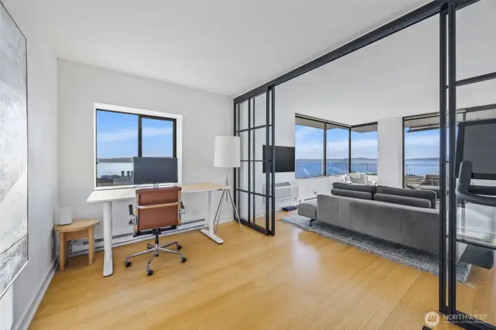 Separation of living room offers flex space for office, guests or workout.