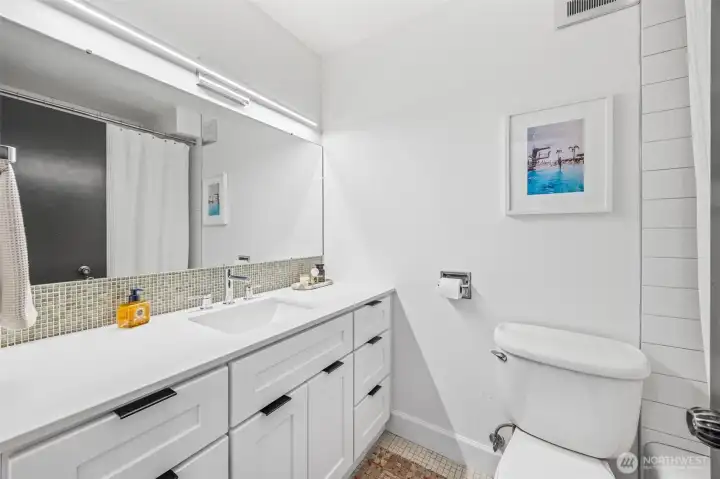 New bath vanity with quartz counters.