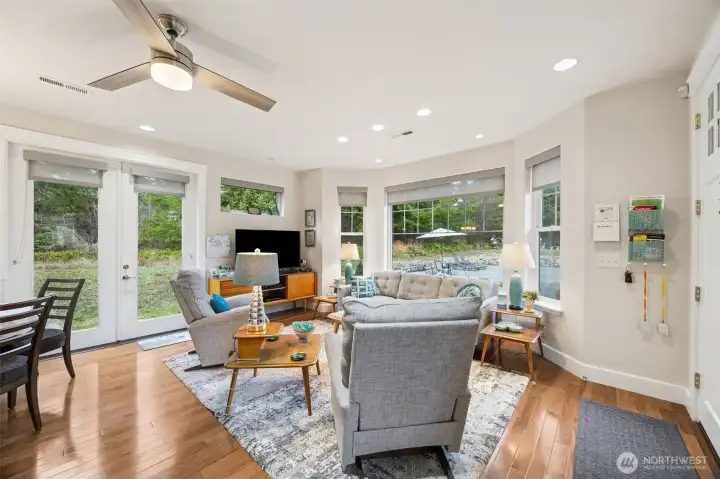 Living room with large windows and double doors