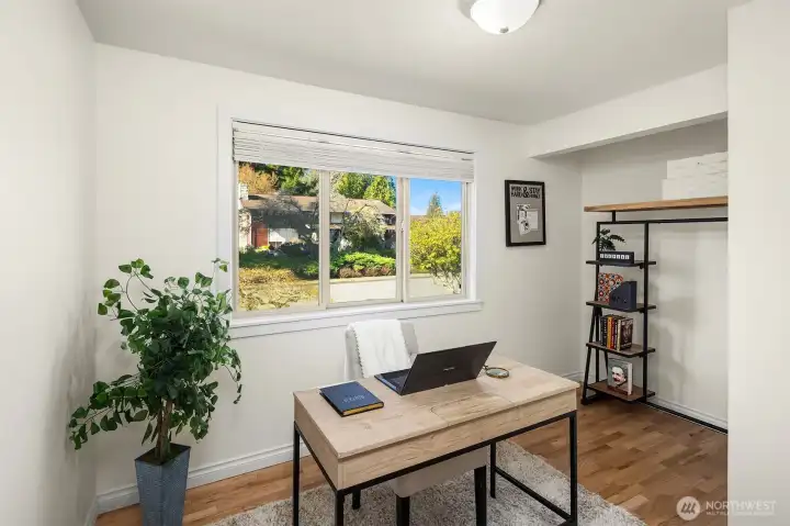 Third smaller bedroom at the front of the house, currently used as an office. Makes a great work from home space or smaller bedroom. Would be an adorable nursery too!!