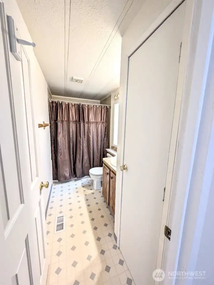 Full bath off primary bedroom.