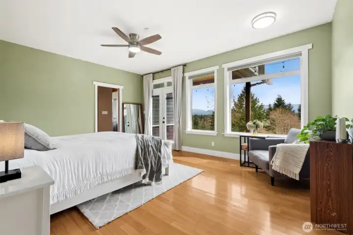 Imagine waking up to these views each morning! The large Owner's Suite enjoys French Doors leading to the front deck. Wake up to these views and often to a herd of Elk in your front yard!