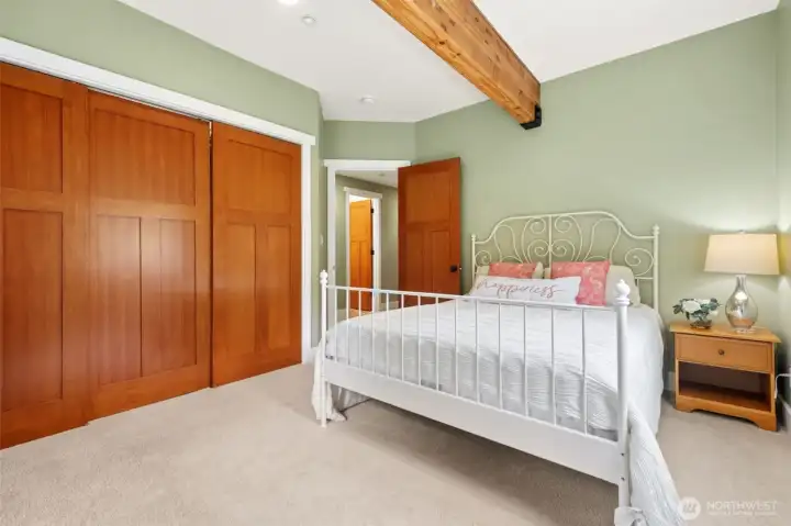 Spacious bedrooms(#2) with lighted closets,  stunning open beams and woodwork.