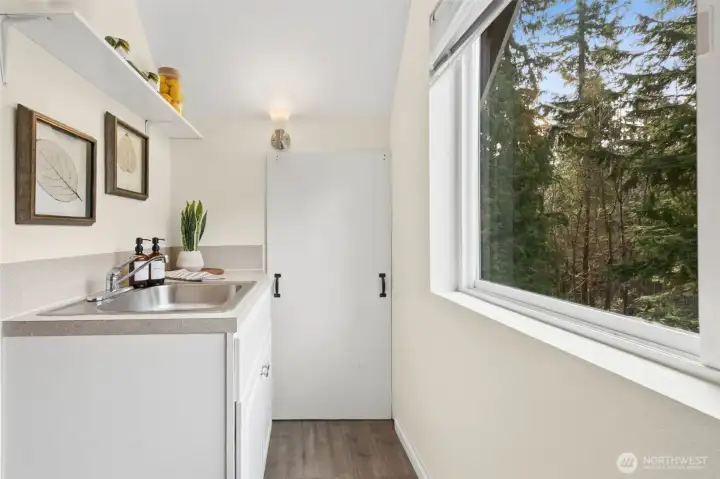Studio Kitchenette with lots of natural light.
