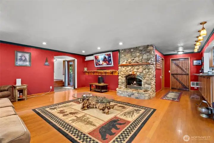 Downstaris living room is right next to the kitchen