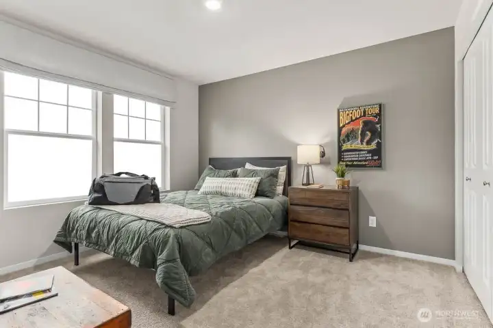 Large guest bedroom with loads of natural light. Photos are representative only and may display different color package and/or upgrades.