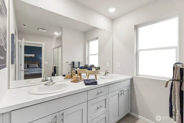 Primary en-suite bathroom vanity. Photos are representative only and may display different color package and/or upgrades.