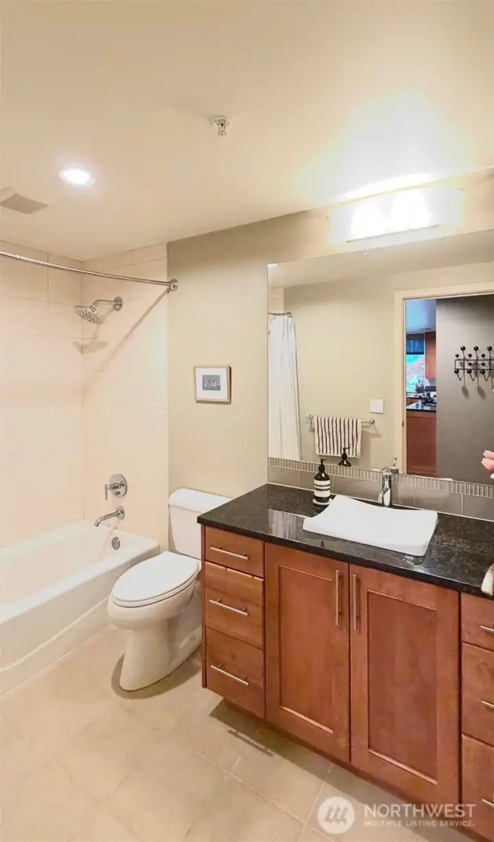 Bathroom with generous vanity space and functional layout.