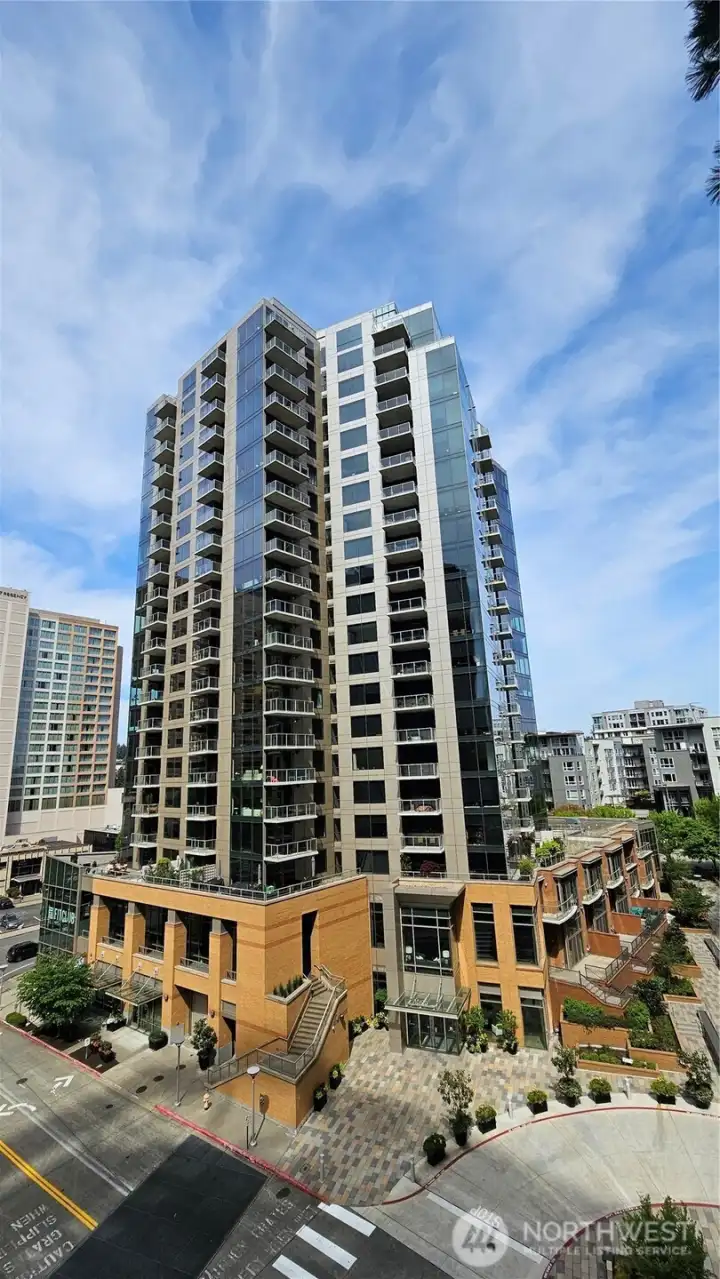 Modern high-rise residence with striking glass façade and contemporary architecture in the heart of Downtown Bellevue