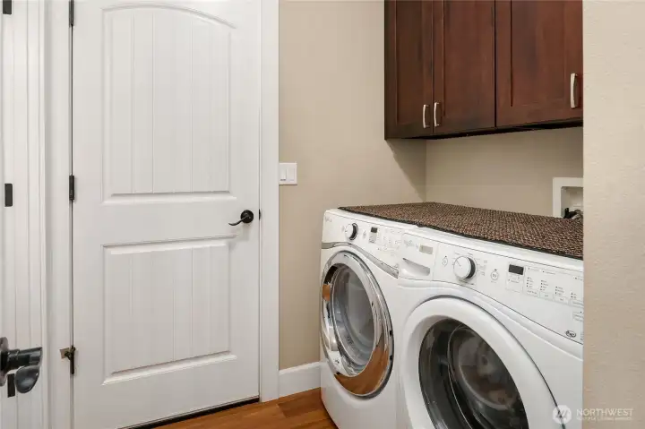 Convenient main-floor laundry keeps daily routines simple and efficient.