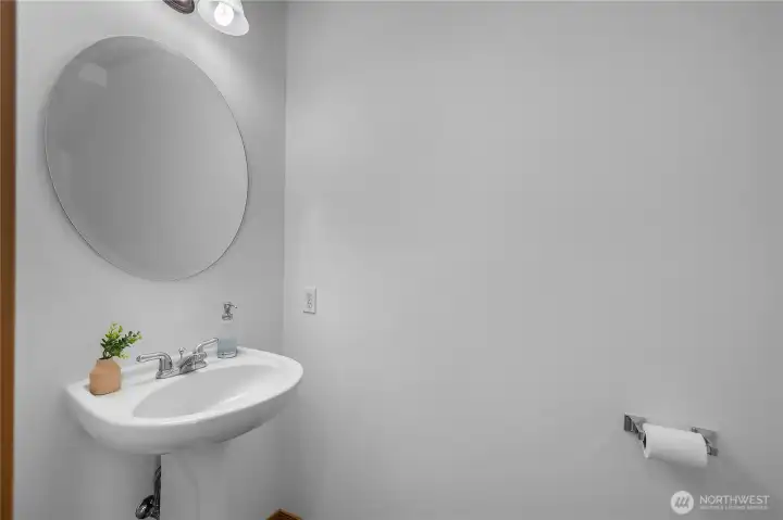 Centralized 1/2 bath downstairs. Centralized 1/2 bath downstairs.