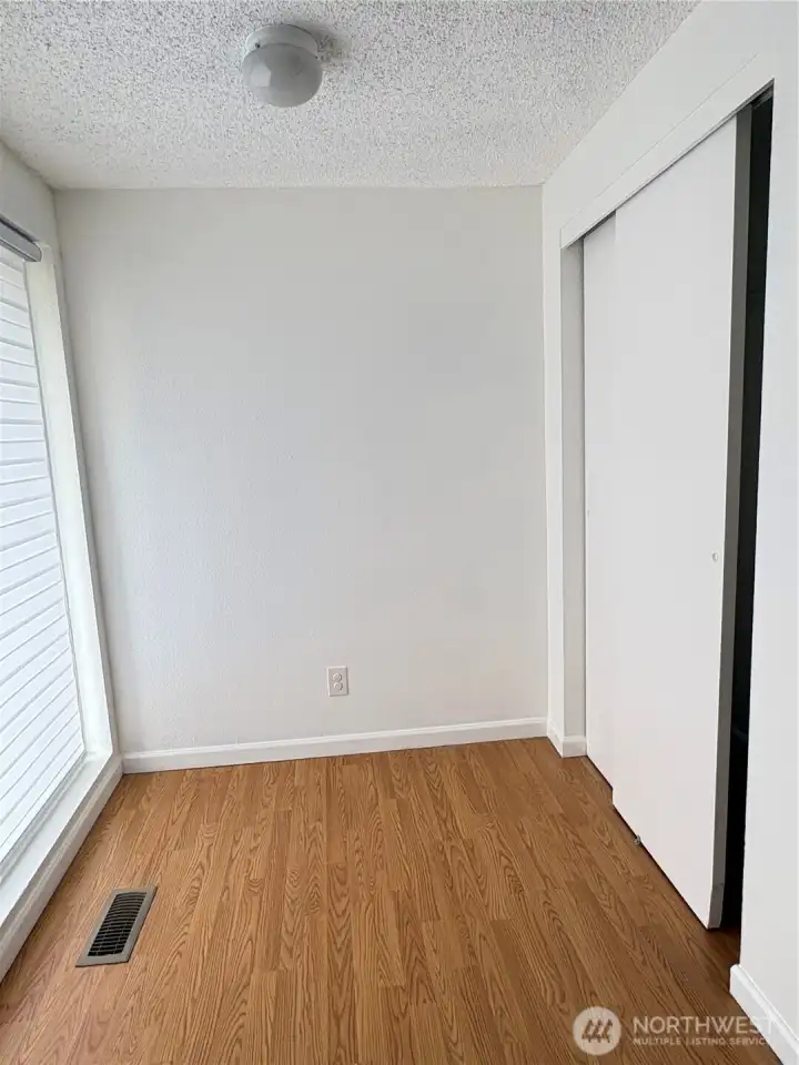 Room to decorate and space to store outwear in closet