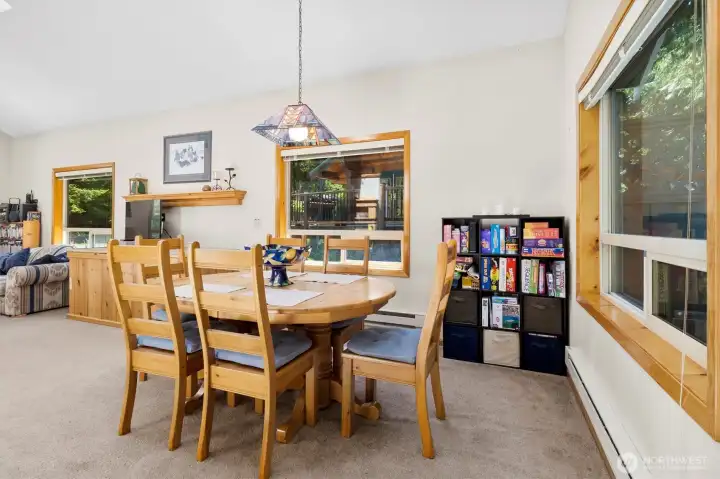Dining space open to the kitchen—perfect for gatherings and game nights.