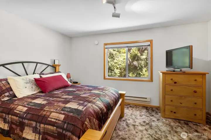 Upstairs - Comfortable primary bedroom with space to unwind.