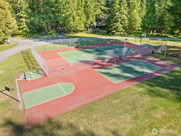 Community sports court for basketball/pickleball and recreation.