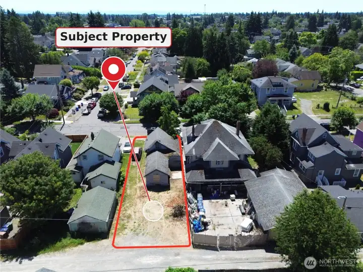Drone view, looking South from alley. Boundaries approximate, buyer to verify.