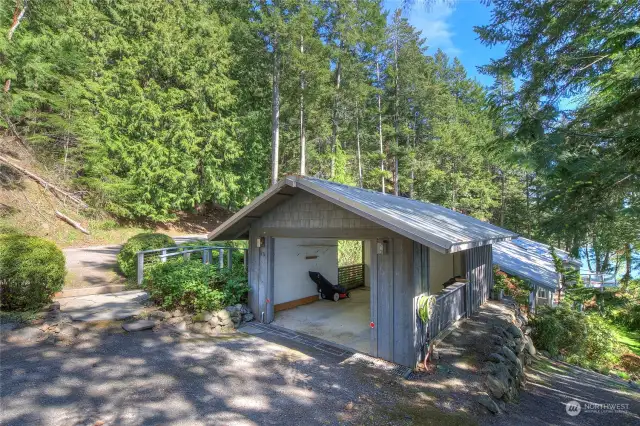 Main carport with work and storage space