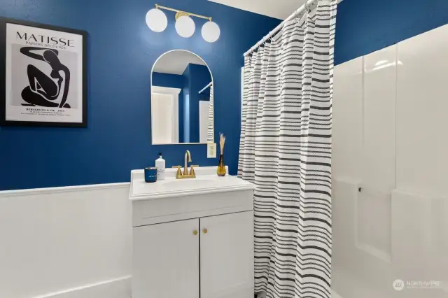 Primary bathroom - just out of frame is the classic black-and-white hex tile floor!