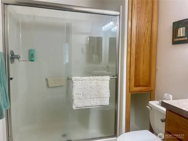 both bathrooms have large showers