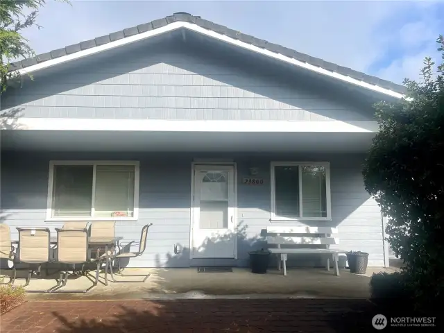 The evening sun lights up the front of the home