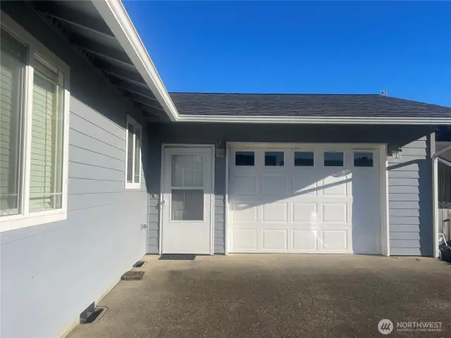 one car garage with lots of room for tools and storage