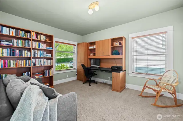 Main floor bedroom or office with built ins