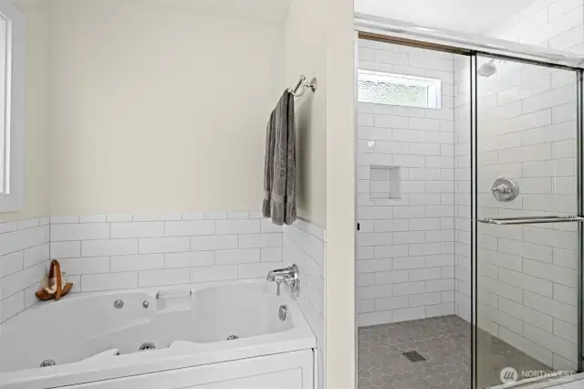 Jetted tub and large subway tiled shower is also a Jack n Jill to 1/2 bath and 4th bedroom