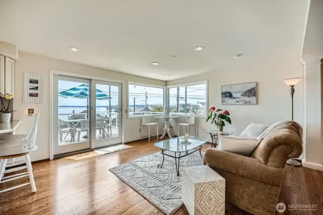 The family room off the kitchen leads to the deck!