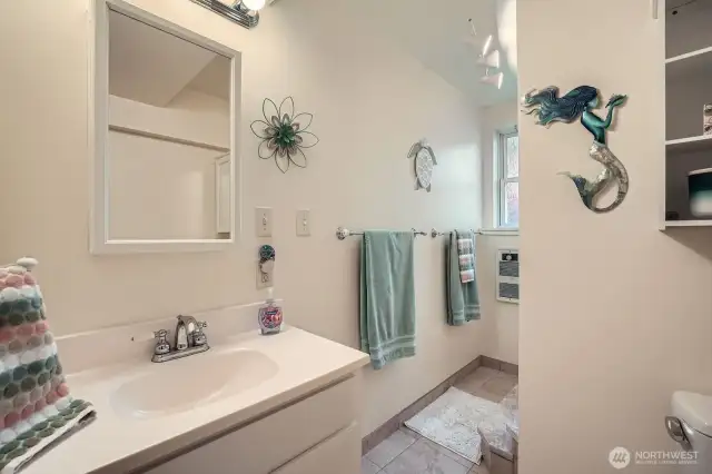 The 3/4 bath downstairs.