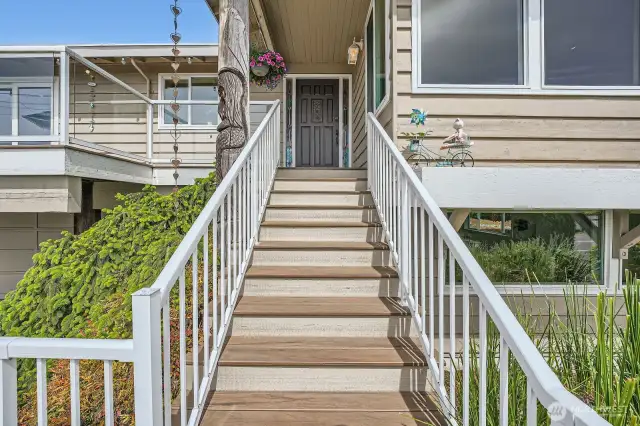 A formal entrance to the main level, adjoining the deck.