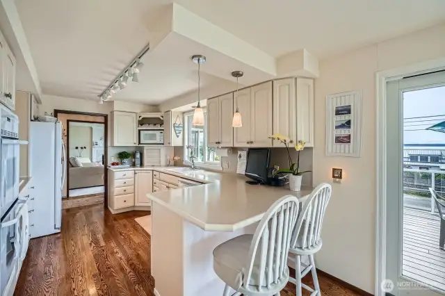 The kitchen opens to a social family room.