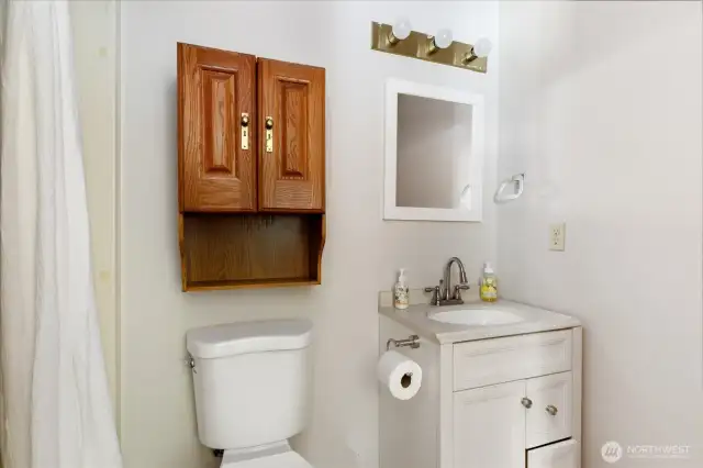 3/4 bath is perfectly placed off the laundry room so you can strip down out of your work clothes and throw them right in the washing machine!
