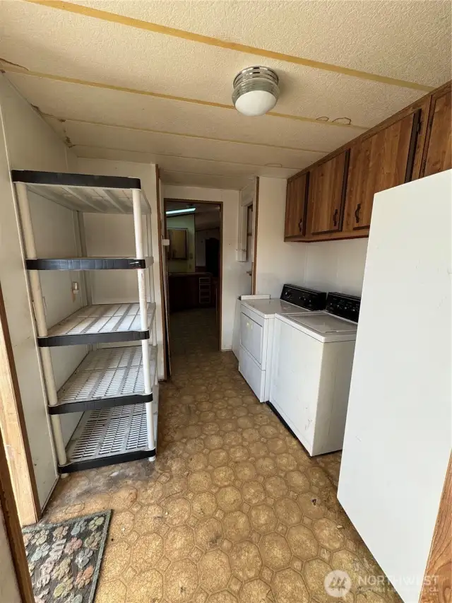 Utility Room off the Back Door Entrance.