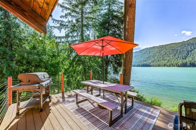 Spacious outdoor deck featuring a propane BBQ—ideal for summer cookouts.