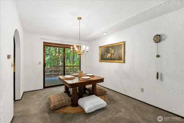 Dining room with sliders to deck.