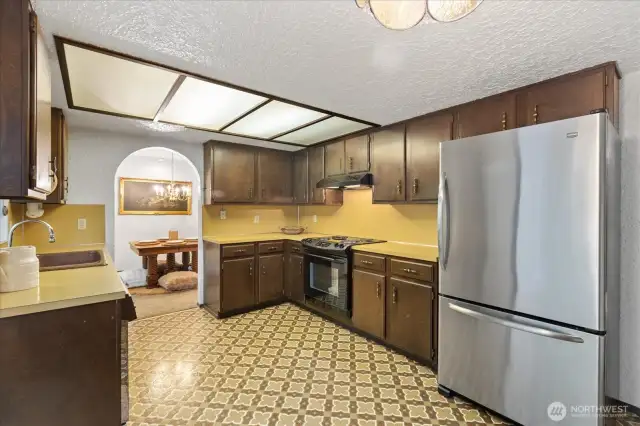 Looking into kitchen from eating nook.