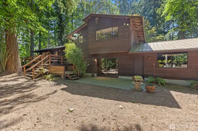 Back of the house. Lower deck is hot tub ready.